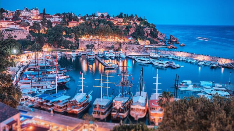 Aerial,Night,View,Of,The,Picturesque,Harbor,With,Marina,Port